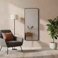 Miroir mural pleine longueur encadré en métal noir de 71 po