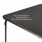 Table pliante pour repas, jeux et petits espaces avec plateau en PVC facile à nettoyer